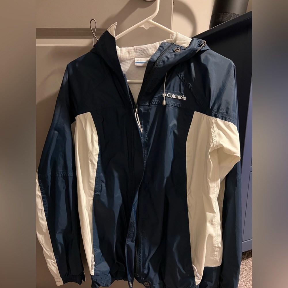 Columbia navy blue and white rain jacket.